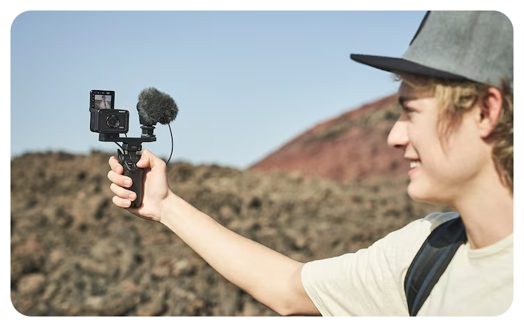 Sony RX0 II mounted on tripod with external microphone for vlogging content